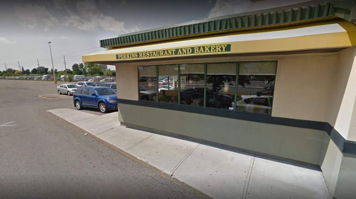 A few ceiling tiles at Perkins restaurant fell on customers heads, sparking a large scale response from Ottawa emergency response teams, who mistook the incident for a total ceiling failure.