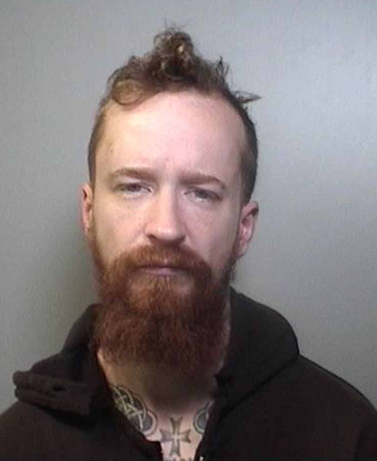 Police say 34-year-old Charles Potts is described as white, approximately six feet tall, with a medium build, red hair and a beard.