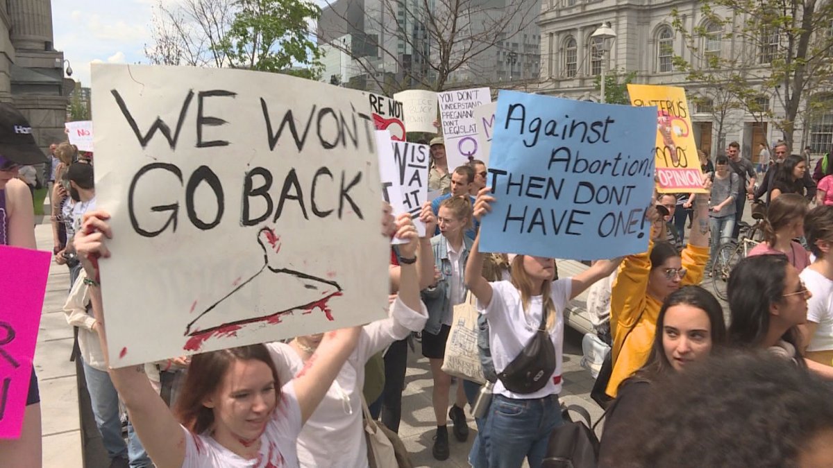 Demonstrators march in Montreal during a pro-choice rally on Sunday, May 26, 2019.