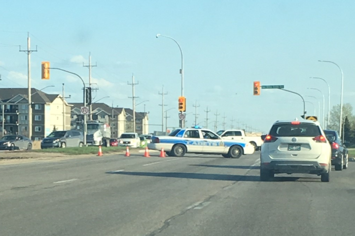 Winnipeg police on scene in Sage Creek after a collision involving a motorcycle and a vehicle.