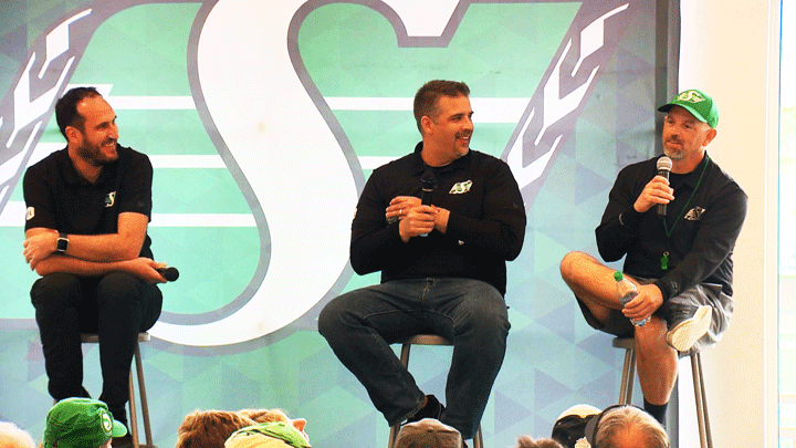 Saskatchewan Roughriders president and CEO Craig Reynolds (left), along with GM Jeremy O'Day (centre) and head coach Craig Dickenson (right) took part in a fan forum on May 25, 2019.