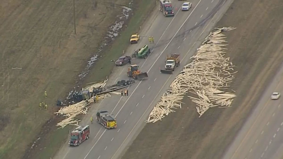 Lumber was spilled all over Highway 16 near Jennifer Heil Way west of Edmonton on May 1, 2019.