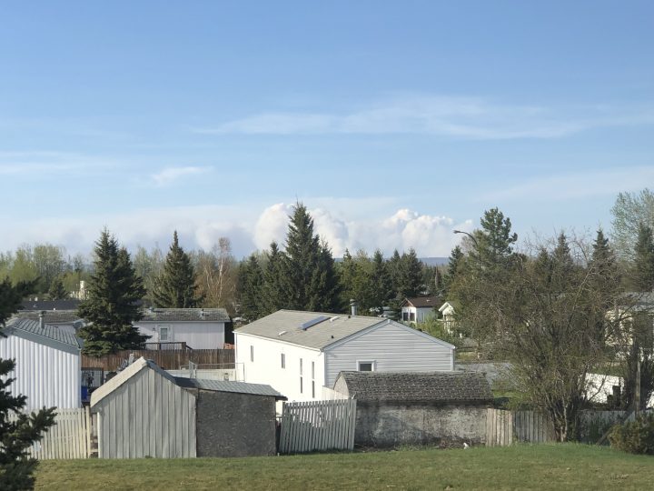 Smoke can be seen in the distance near Slave Lake as wildfires burn on Saturday.