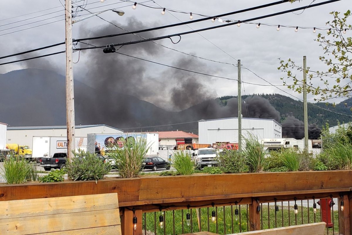 Black smoke rises from a scrap metal recycling facility in Squamish Friday after a propane tank exploded.