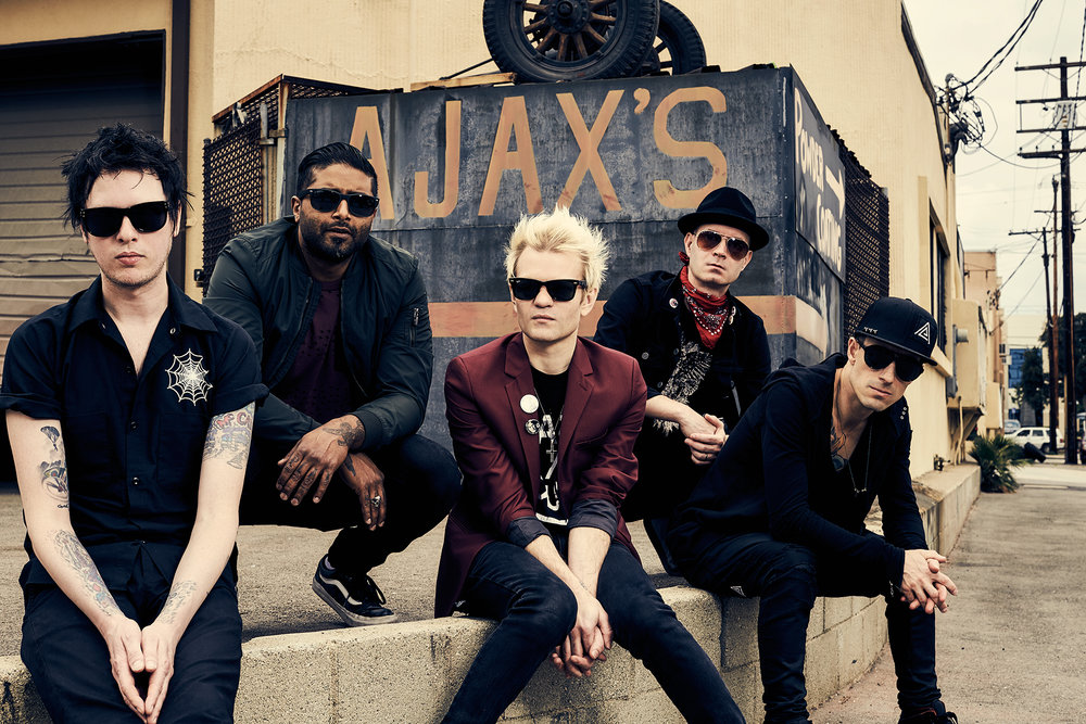 (L-R) Sum 41: Jason McCaslin, Dave Baksh, Deryck Whibley, Tom Thacker and Frank Zummo in 2019.