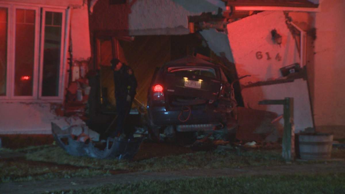 An officer surveys the scene following the crash.