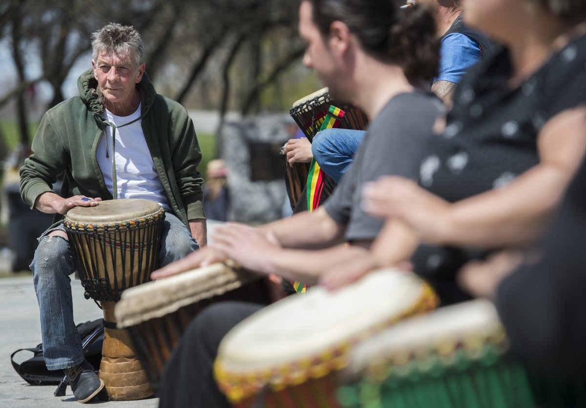 People play drums during the Tam-Tams festival in Montreal, Sunday, May 12, 2019. 