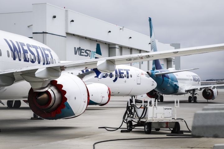 Grounded WestJet Boeing 737 Max aircraft are shown at the airline's facilities in Calgary, Alta., Tuesday, May 7, 2019. WestJet Airlines Ltd. topped expectations as it reported its first-quarter profit climbed more than 30 per cent compared with a year ago. 