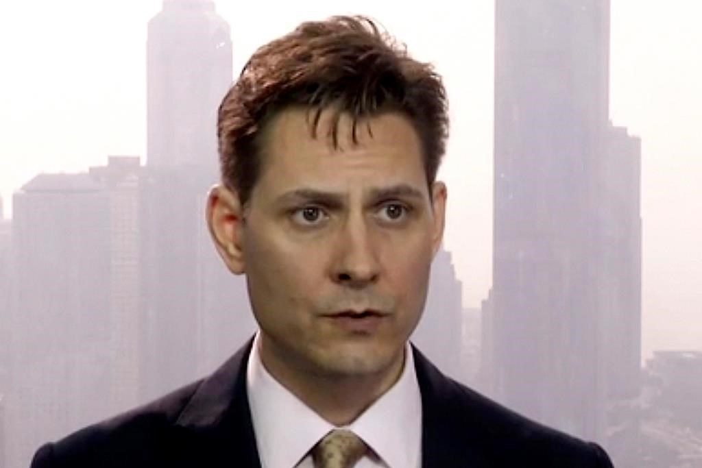 FILE - In this file image made from March 28, 2018, video, Michael Kovrig, an adviser with the International Crisis Group, a Brussels-based non-governmental organization, speaks during an interview in Hong Kong. Diplomats have visited a Canadian think tank expert on Monday, May 13, 2019, whose detention in China is believed to be an attempt to pressure Canada to release Huawei executive Meng Wanzhou.