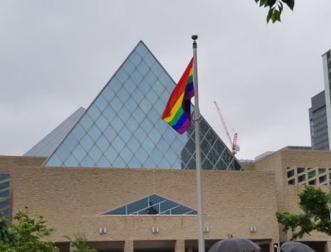 The Pride flag is raised outside Edmonton City Hall on Friday, June 7, 2019.