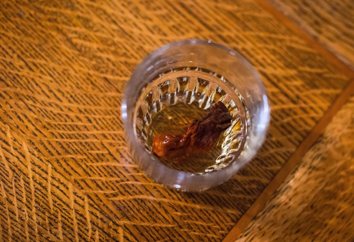 The Sourtoe Cocktail, a shot of whisky with a dehydrated human toe in the drink, is seen at the Downtown Hotel, in Dawson City, Yukon, on Sunday, July 1, 2018. 