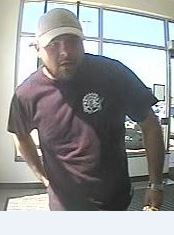 Police release photos of suspects in Burlington distraction theft - image