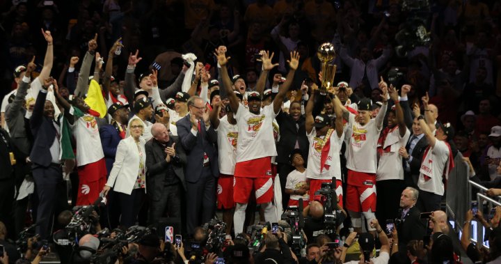 Fans celebrating Toronto Raptors' NBA championship rush to secure
