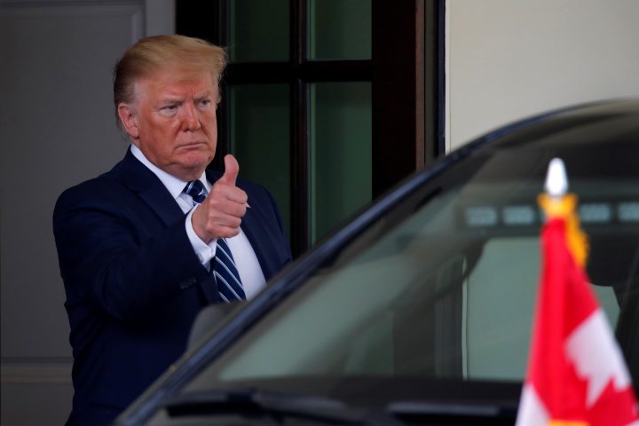 U.S. President Donald Trump gives a thumbs-up to Canada's Prime Minister Justin Trudeau, as he leaves after a meeting at the Oval Office of the White House in Washington, U.S., June 20, 2019. 