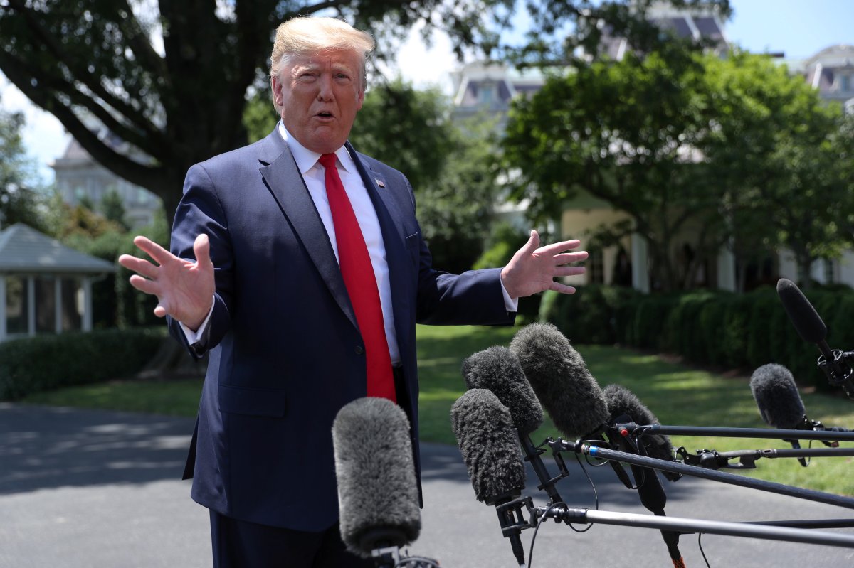 U.S. President Donald Trump talks to reporters as he departs for travel to the G20 Summit in Osaka, Japan at the White House in Washington, U.S., June 26, 2019. 