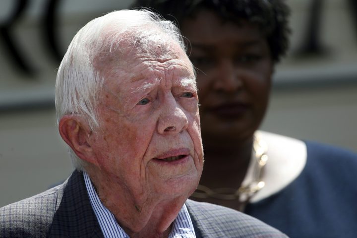 In this Sept. 18, 2018 file photo, former President Jimmy Carter speaks during a news conference, in Plains, Ga. A spokeswoman says former U.S. President Jimmy Carter says he has broken his hip. She said that Carter underwent surgery at a medical center in Americus, Ga. 