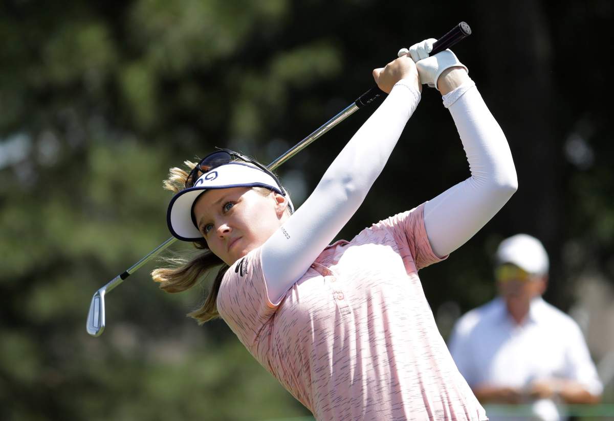 Brooke Henderson watches his tee shot on the second hole during the final round of the Pure Silk Championship golf tournament at Kingsmill Resort, in Williamsburg, Va., Sunday, May 26, 2019.