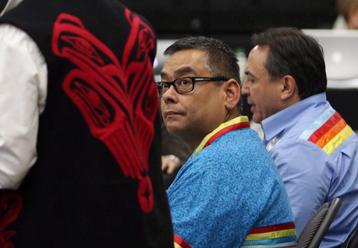 Regional Chief Shane Gottfriedson looks on as Carolyn Bennett, Minister of Indigenous and Northern Affairs, speaks at the Assembly of First Nations' annual general meeting at the Songhees Wellness Centre in Victoria on October 24, 2016. 