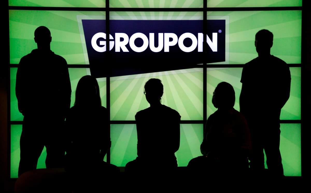 Some small business owners in Quebec say Groupon Inc. owes them thousands of dollars after signs the company is scaling back from the province. 
