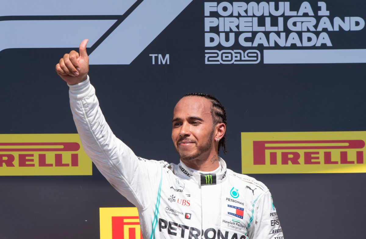 Mercedes driver Lewis Hamilton of Great Britain celebrates his victory at the Canadian Grand Prix on Sunday. 