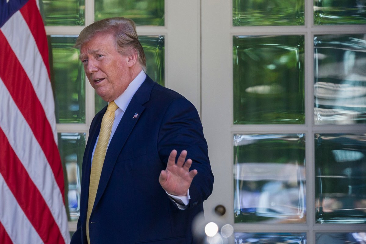 U.S. President Donald Trump waves as he departs after speaking in the Rose Garden of the White House, Friday, June 14, 2019, in Washington.