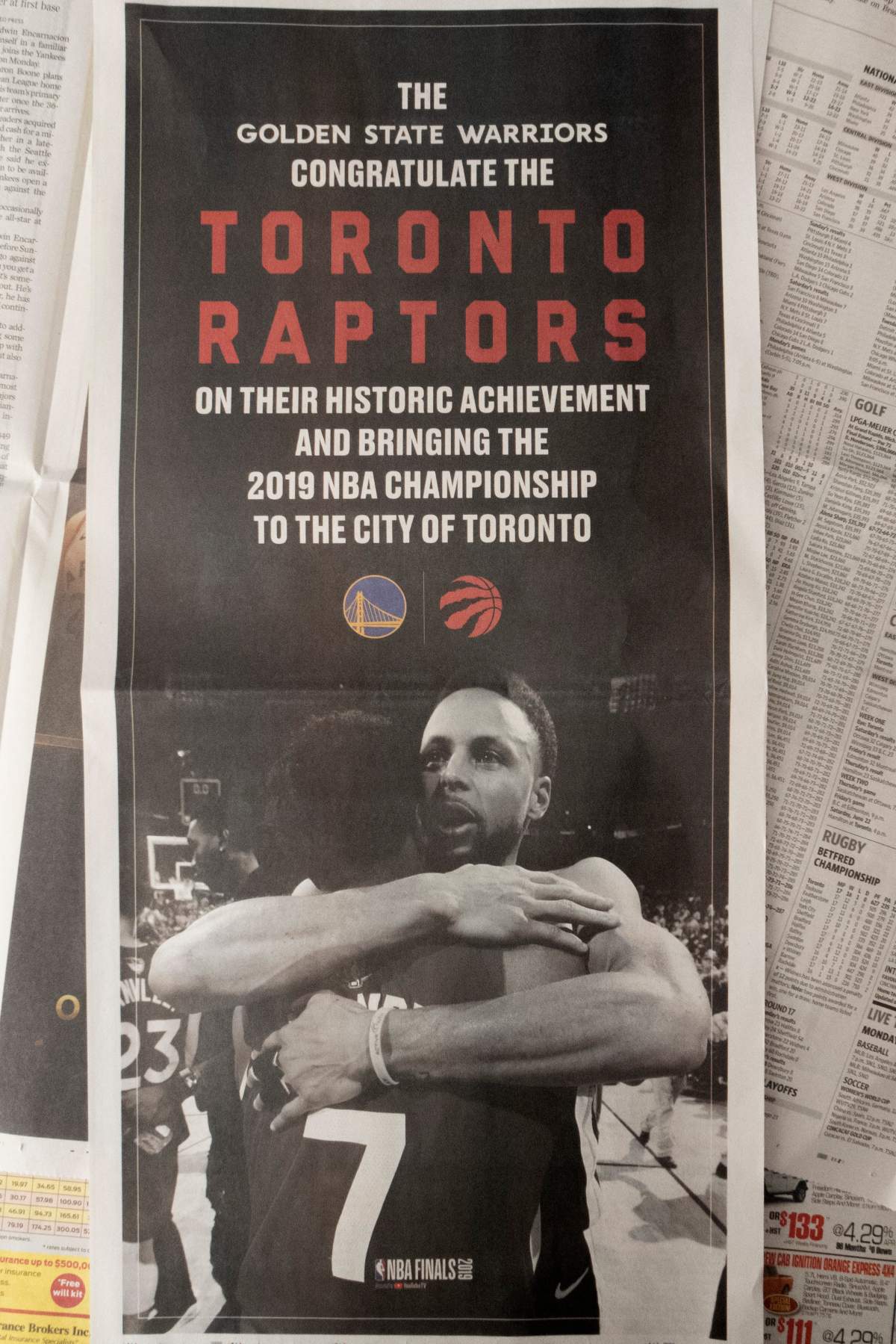 A full-page ad in the Toronto Star from the Golden State Warriors congratulating the Toronto Raptors on their NBA Championship is shown in Toronto on Monday, June 17, 2019. THE CANADIAN PRESS/Graeme Roy