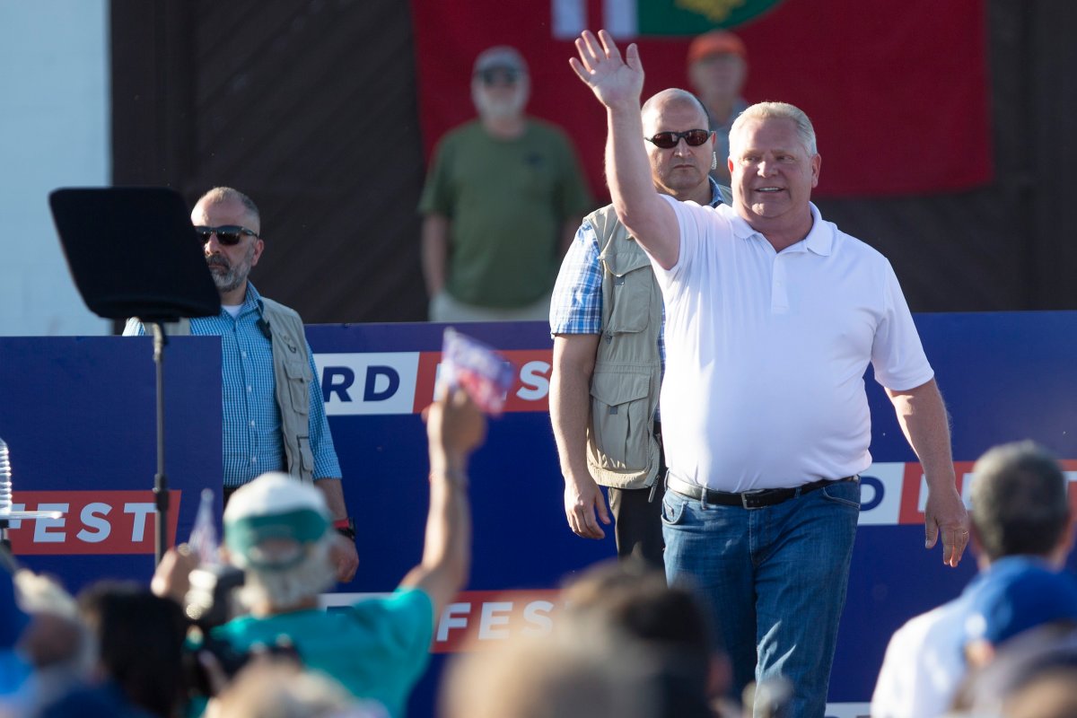 Ontario Premier Doug Ford waves to the crowd after delivering remarks during Ford Fest in Markham, Ont., on Saturday June 22, 2019.