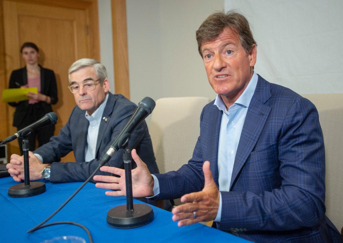 Stephen Bronfman, right, and Pierre Boivin speak to the media about the prospect of Major League Baseball returning to Montreal Wednesday, June 26, 2019.