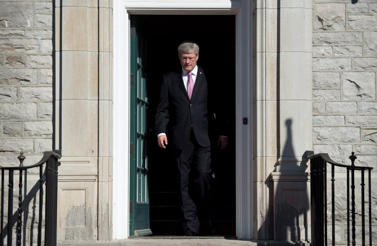 Then-prime minister Stephen Harper steps out of his residence at 24 Sussex Drive in a 2014 file photo.