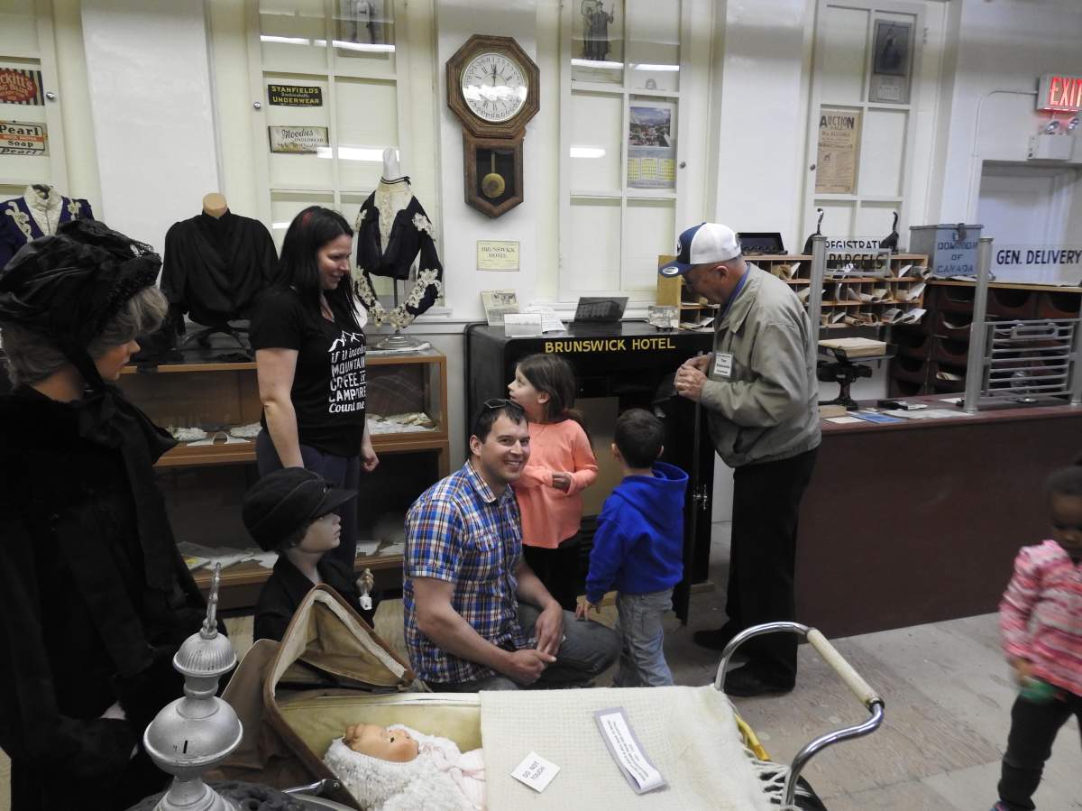 Stephen Mills and his family after he unlocked a safe,which had been locked for 40 years, at the Vermilion Museum. 