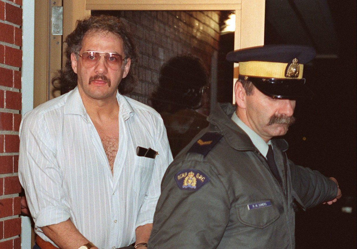 Allan Legere departs from court in Burton, New Brunswick, as he waits for jurors in his murder trial to return a verdict in Burton, N.B. on Nov. 2, 1991. 
