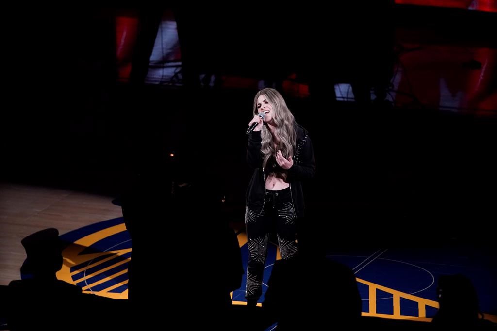 Tenille Arts performs the national anthem of Canada before Game 3 of basketball’s NBA Finals between the Golden State Warriors and the Toronto Raptors in Oakland, Calif., Wednesday, June 5, 2019. THE CANADIAN PRESS/AP/Tony Avelar