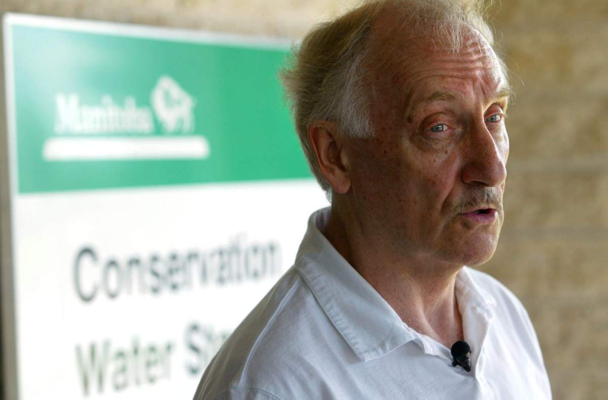 Manitoba government flood forecaster Alf Warkentin talks to media about recent flood updates on Saturday July 2, 2005 in Winnipeg. Homeowners along the Red River breathed a sigh of relief as water levels stabilized Saturday, but officials warned that another deluge like the one that recently hit the region could put their properties at risk again. (CP PHOTO/Winnipeg Free Press - Mike Aporius).