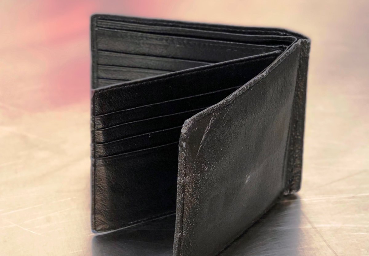 North Vancouver RCMP said this "boring" wallet was found stuffed with cash in the Capilano Mall on May 2. 