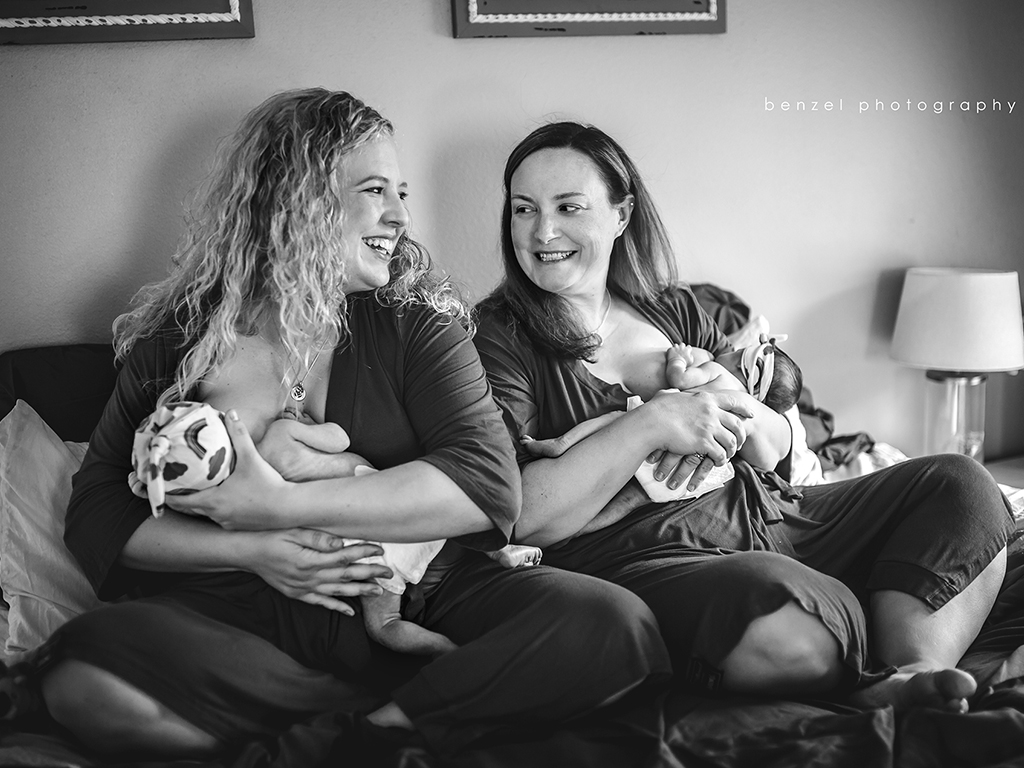 Jaclyn (left) and Kelly (right) Pfeiffer breastfeeding their twins. Courtesy of Melissa Benzel.