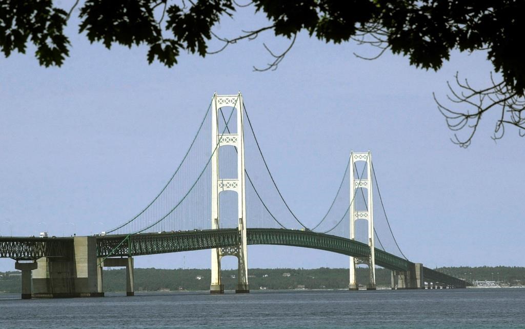 FILE – This July 19, 2002, file photo, shows the Mackinac Bridge that spans the Straits of Mackinac from Mackinaw City, Mich.