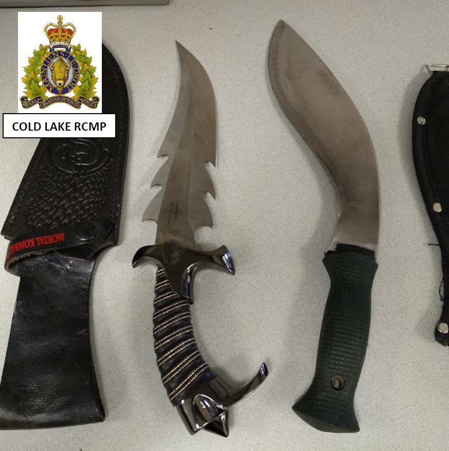 RCMP seized a number of knives from the back seat of a vehicle that had been reported as stolen.
