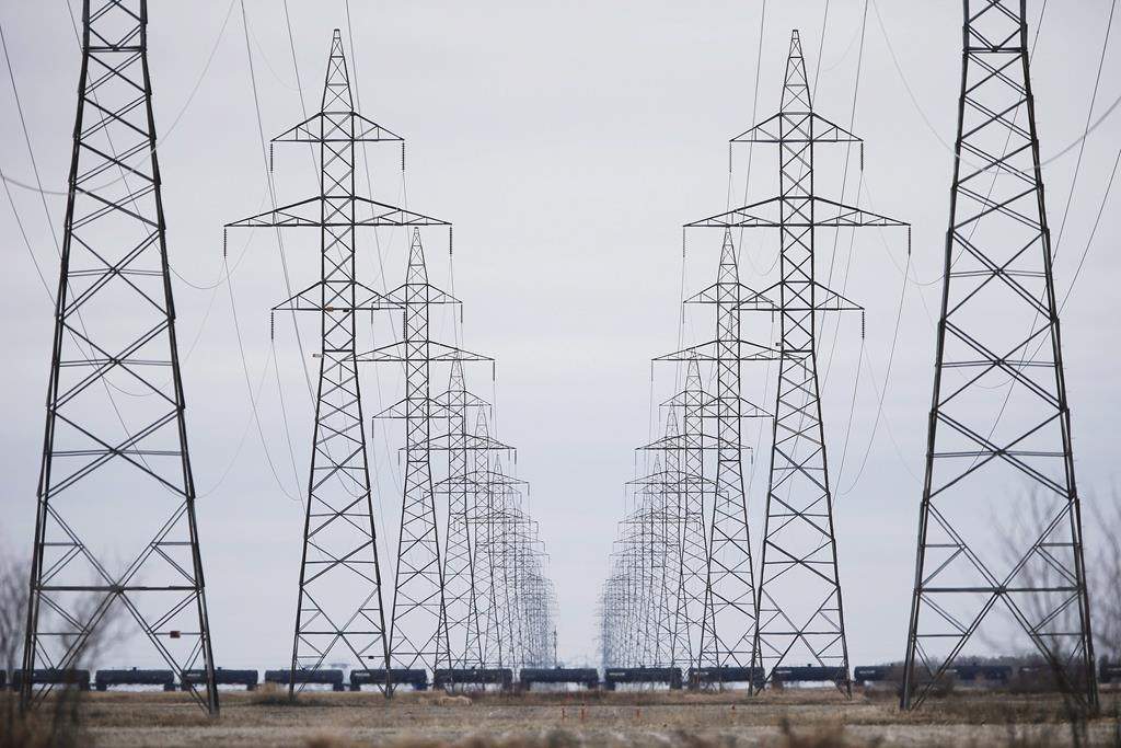 Manitoba Hydro power lines are photographed just outside Winnipeg on May 1, 2018. The federal government has approved the proposed $453-million Manitoba-Minnesota hydro-electric power transmission project.The 213-kilometre, 500-kilovolt power line will stretch from a point northwest of Winnipeg and cross the Canada-United States border near the small Manitoba community of Piney.