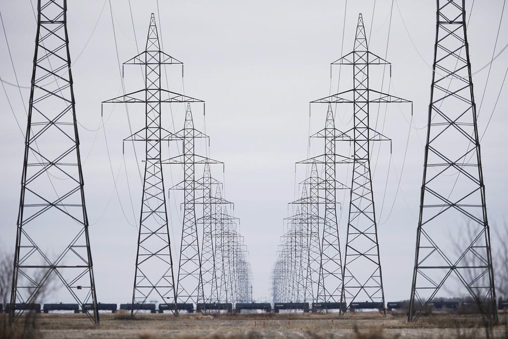 Manitoba Hydro power lines are photographed just outside Winnipeg on May 1, 2018. The federal government has approved the proposed $453-million Manitoba-Minnesota hydro-electric power transmission project.The 213-kilometre, 500-kilovolt power line will stretch from a point northwest of Winnipeg and cross the Canada-United States border near the small Manitoba community of Piney.