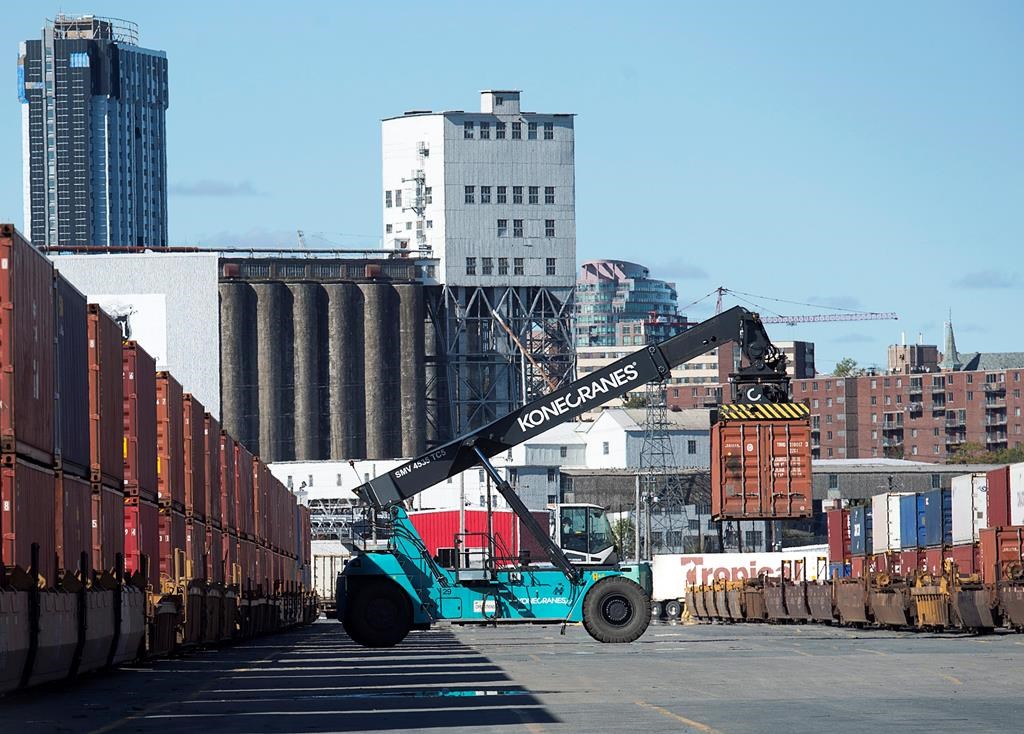 Shipping containers are moved at the Halterm Container Terminal in Halifax on Friday, Oct. 19, 2018. The site is now known as PSA Halifax.