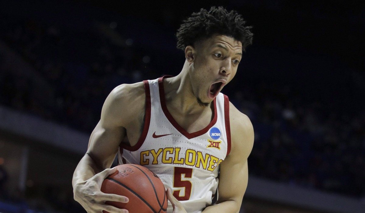 Iowa State's Lindell Wigginton beats Ohio State's Luther Muhammad (1) to a rebound during the first half of a first round men's college basketball game against Ohio State in the NCAA Tournament Friday, March 22, 2019, in Tulsa, Okla.