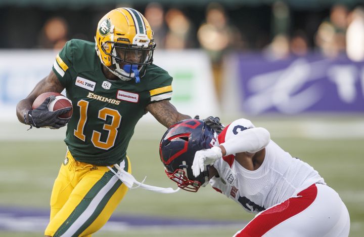 Montreal Alouettes Patrick Levels (3) tries to tackle Edmonton Eskimos Ricky Collins Jr. (13) during first half CFL action in Edmonton, Alta., on Friday June 14, 2019. 