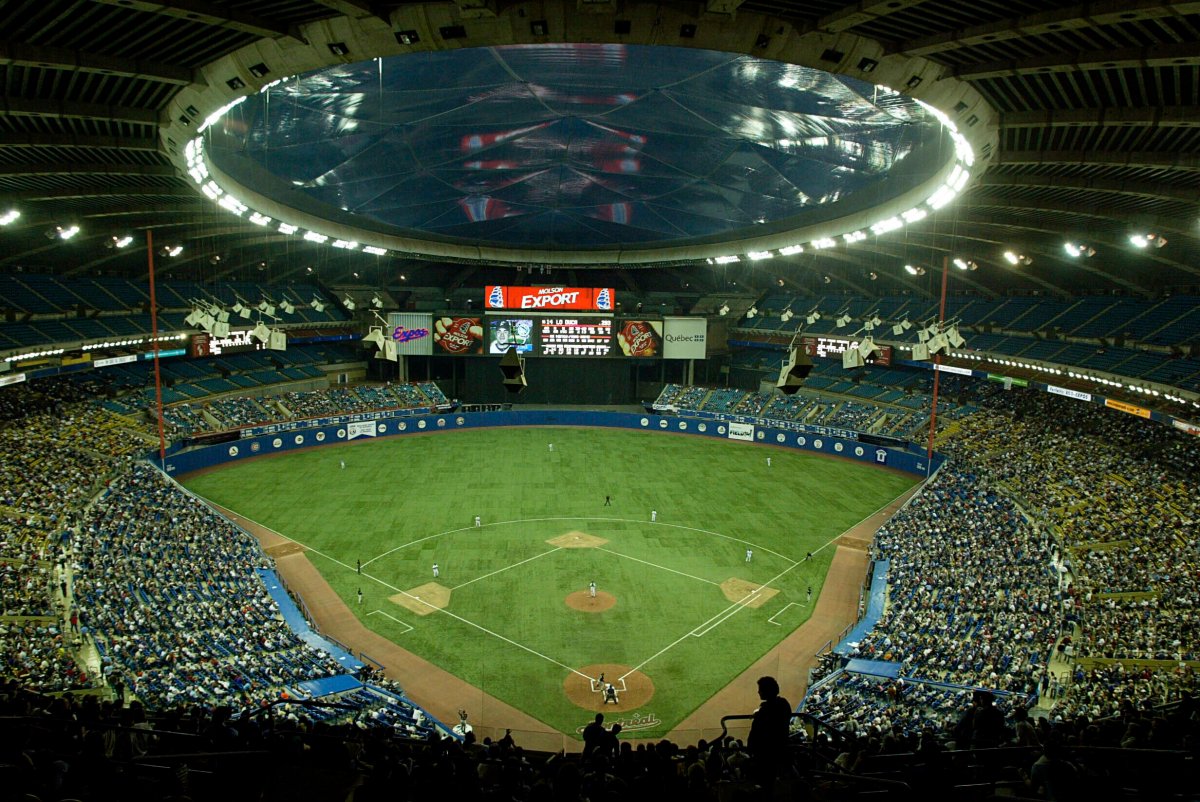 In this Sept. 29, 2004, file photo, fans watch a baseball game between the Montreal Expos and Florida Marlins at Olympic Stadium in Montreal.