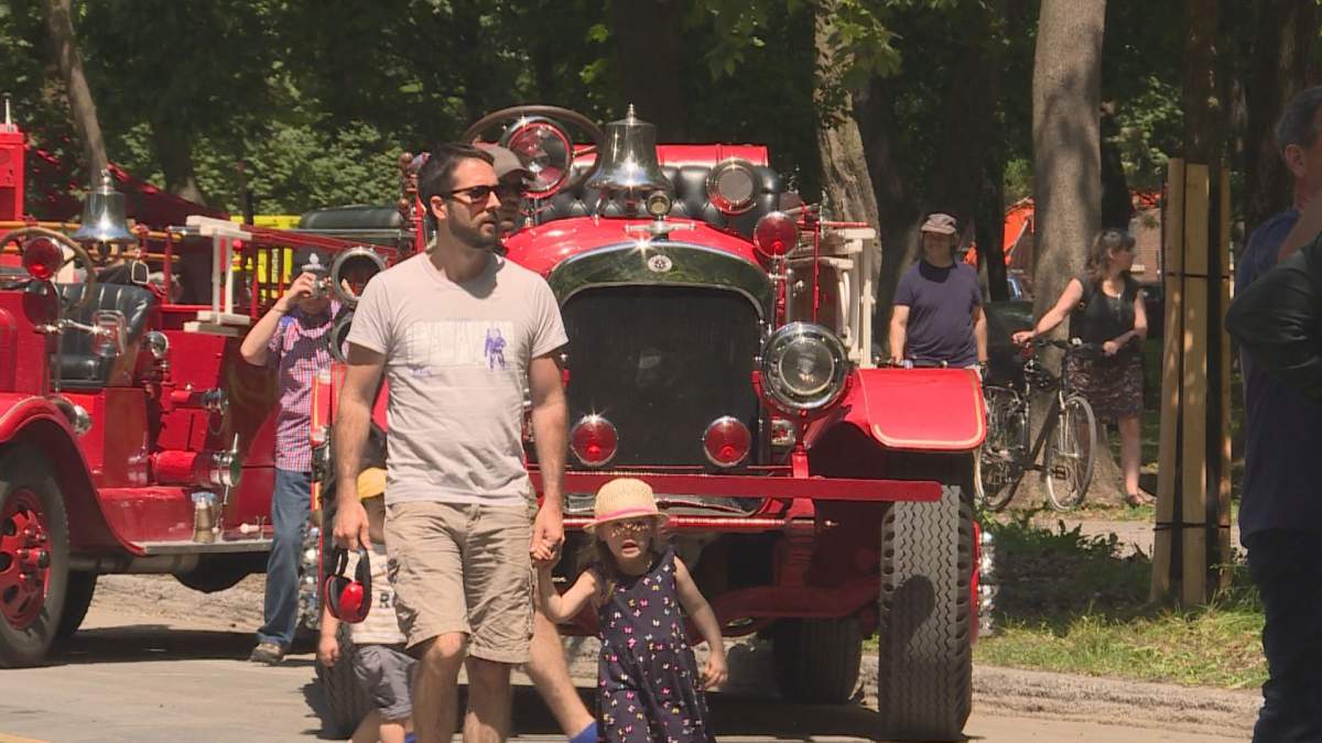 Celebrating 75 years of service Montreal Auxiliary firefighters roll out with parade. 
