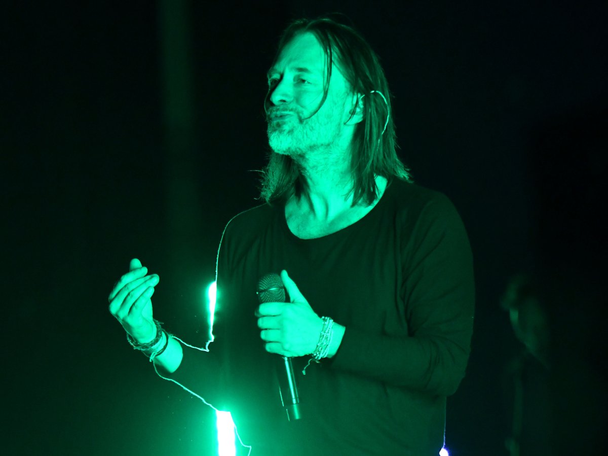 Thom Yorke of Radiohead performing live onstage.