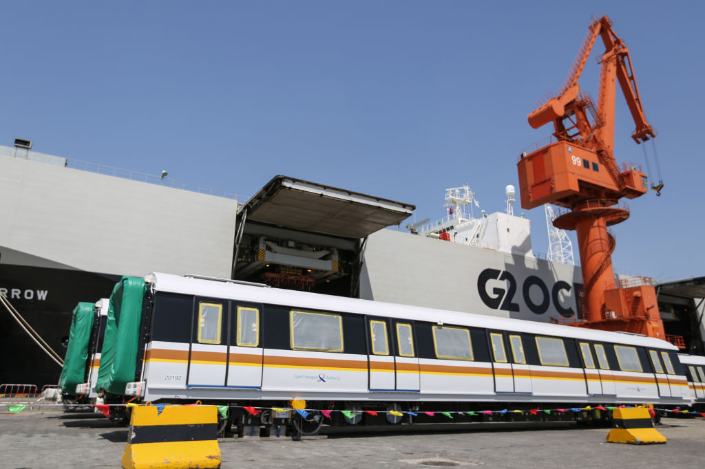 This photo taken on May 20, 2019 shows automated urban subway cars waiting to be exported to Singapore at a port in Qingdao, in China's eastern Shandong province. 