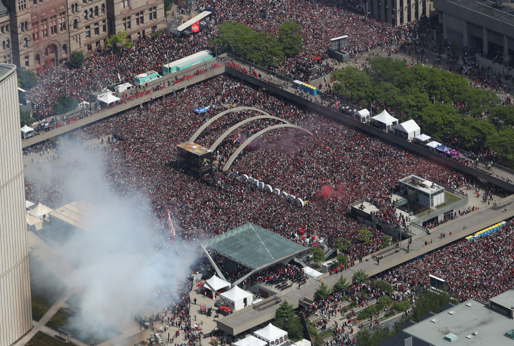 TORONTO, ON – JUNE 17: Fans gather at Nathan Phillips Square as they turn out for the Toronto Raptors NBA Championship Victory Parade after defeating the Golden State Warriors in the Finals on June 17, 2019 in Toronto, Canada. (Tom Szczerbowski/Getty Images)