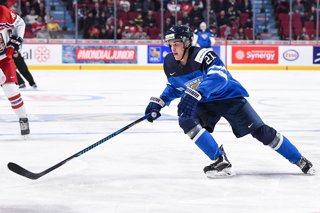 MONTREAL, QC - DECEMBER 26:  Joona Luoto #21 of Team Finland skates during the IIHF World Junior Championship preliminary round game against Team Czech Republic at the Bell Centre on December 26, 2016 in Montreal, Quebec, Canada.  Team Czech Republic defeated Team Finland 2-1.  (Photo by Minas Panagiotakis/Getty Images).