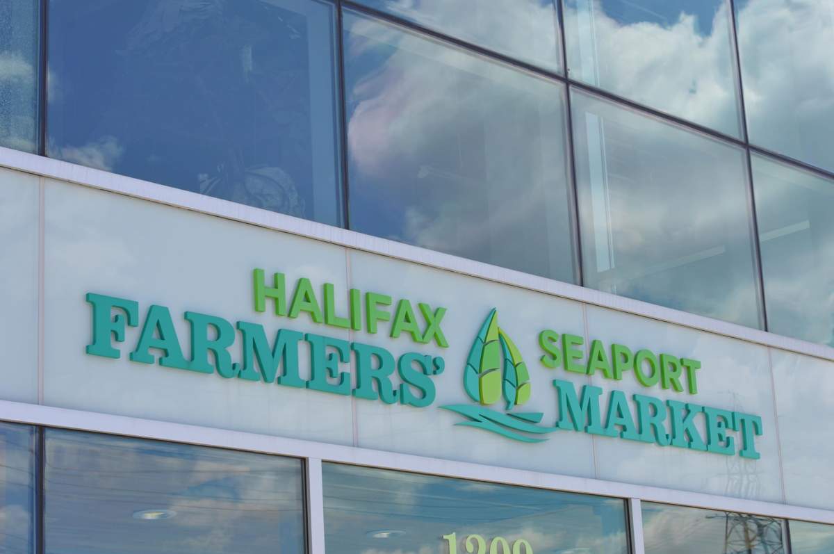 A sign for the Halifax Seaport Farmers Market on June 23, 2019.