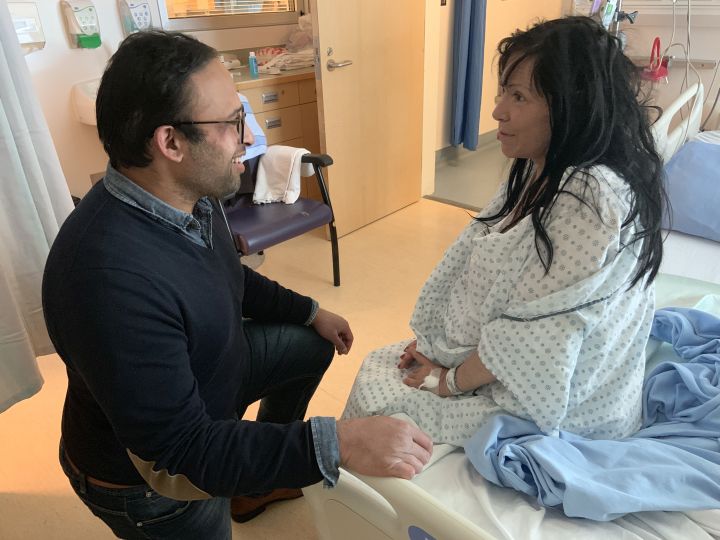 Dr. Monty Ghosh, an addictions and internal medicine specialist at the University of Alberta, speaks with a patient in Calgary on Thursday, June 20, 2019, in this handout photo. 